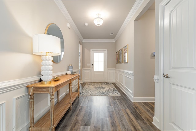 foyer featuring crown molding and dark hardwood / wood-style flooring