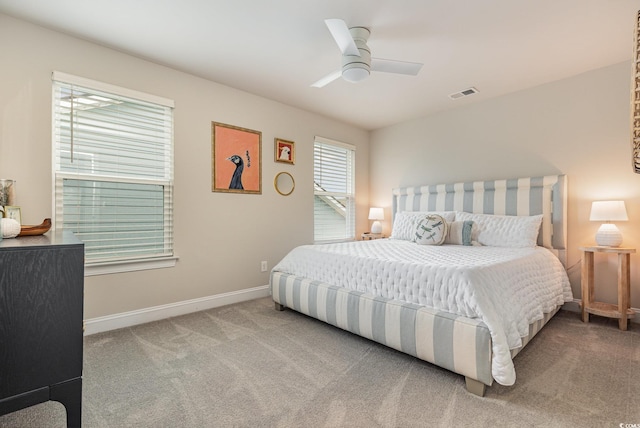 bedroom with ceiling fan and carpet