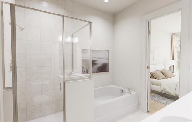 bathroom featuring recessed lighting, a garden tub, a shower stall, and ensuite bathroom