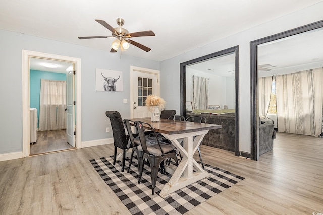 interior space with ceiling fan and light hardwood / wood-style flooring