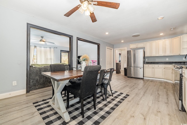 dining area with light wood-type flooring