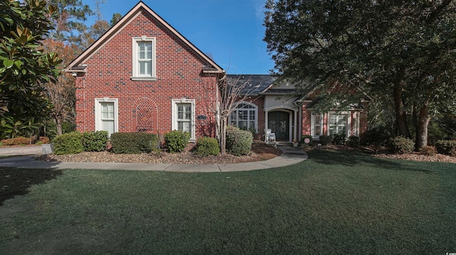 front of property with a front yard