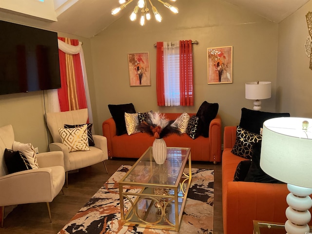 living room with hardwood / wood-style floors, lofted ceiling, and an inviting chandelier