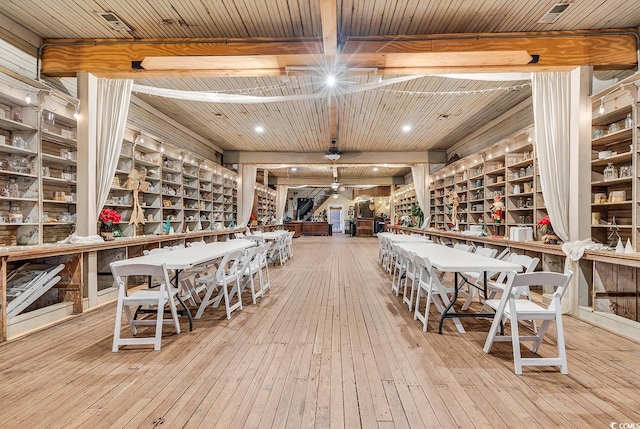 6011 Dick Pond Rd, Myrtle Beach, SC 29588 - dining space with light wood-type flooring, ceiling fan, and beamed ceiling