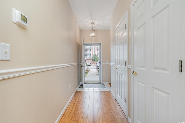 doorway featuring light hardwood / wood-style floors