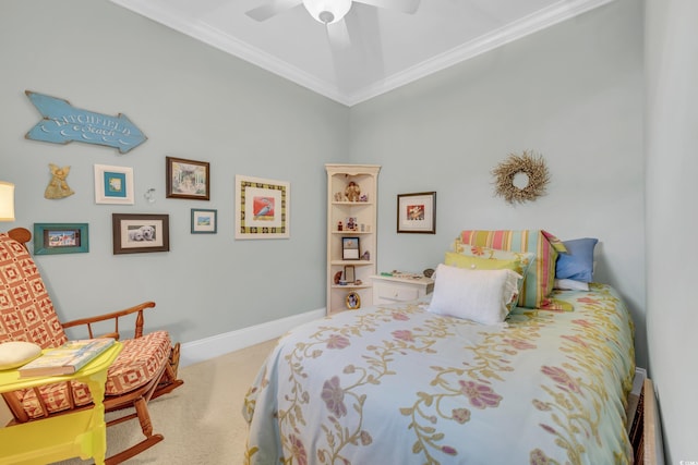 bedroom with ceiling fan, ornamental molding, and carpet floors