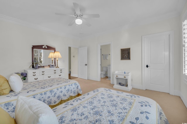 carpeted bedroom featuring connected bathroom, ceiling fan, and crown molding