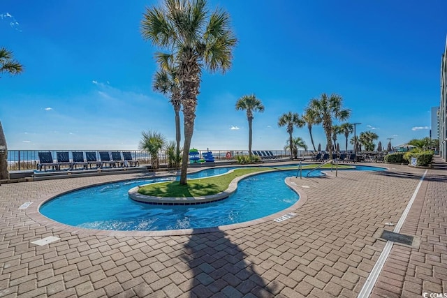 2311 S Ocean Blvd Unit 1125, Myrtle Beach, SC 29577 - community pool featuring a patio area