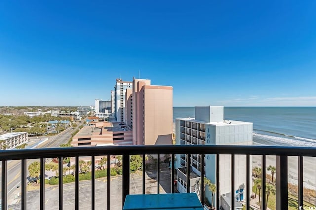 balcony featuring a water view