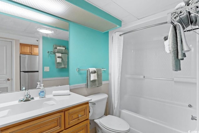 full bathroom with vanity, toilet, and shower / tub combo with curtain