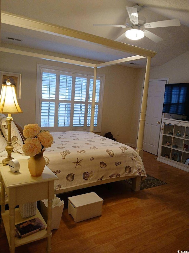 bedroom featuring hardwood / wood-style flooring and ceiling fan