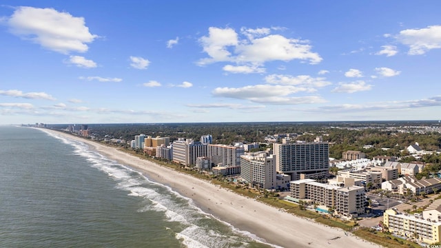 birds eye view of property featuring a view of the beach and a water view