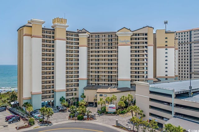 view of building exterior featuring a water view