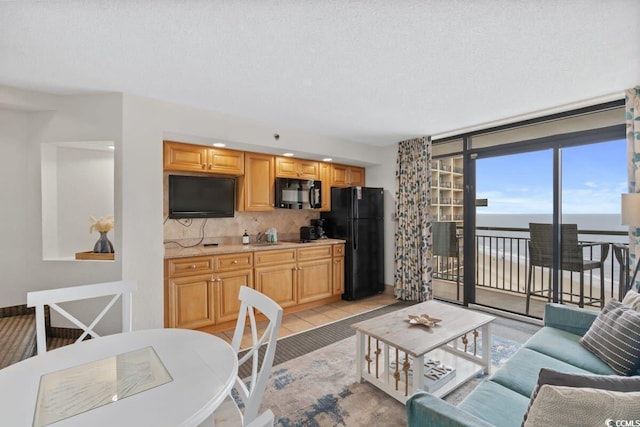 4800 S Ocean Blvd Unit 1219, North Myrtle Beach, SC 29582 - living area with a textured ceiling