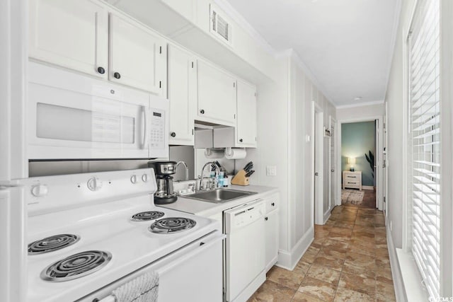 kitchen with sink, white cabinets, white appliances, and ornamental molding