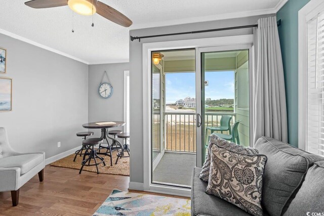 9400 Shore Dr Unit 312, Myrtle Beach, SC 29572 - doorway to outside with ceiling fan, wood finished floors, baseboards, and ornamental molding