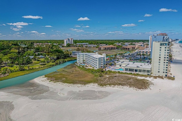 drone / aerial view with a view of the beach and a water view