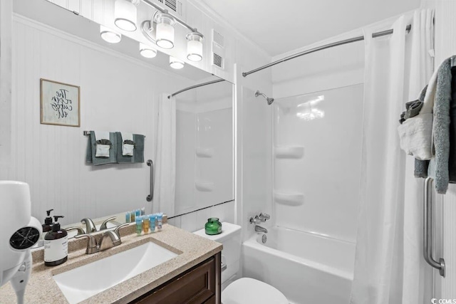 full bathroom with vanity, shower / bath combination with curtain, and toilet