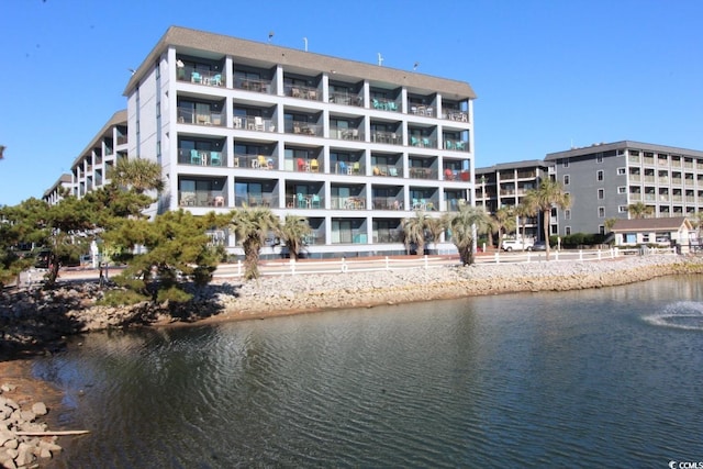 view of property with a water view