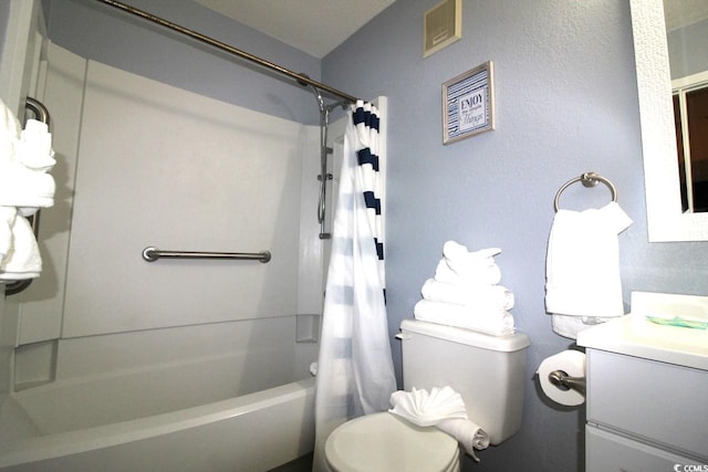 full bathroom with vanity, toilet, and shower / bath combo