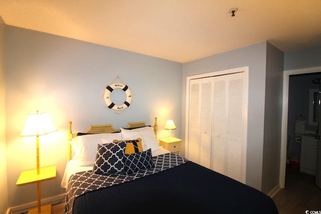 5905 S Kings Hwy Unit 545-B, Myrtle Beach, SC 29575 - bedroom with a closet, wood finished floors, and baseboard heating