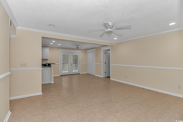 unfurnished living room with french doors, a textured ceiling, ceiling fan, and crown molding