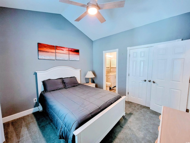 bedroom with carpet flooring, ensuite bath, ceiling fan, vaulted ceiling, and a closet