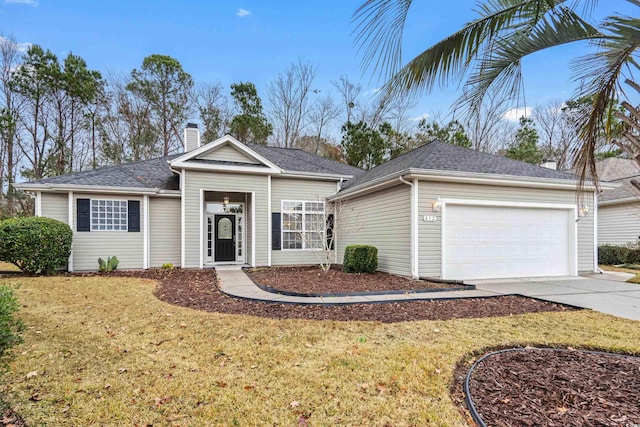 ranch-style house featuring a front yard and a garage