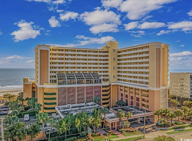 view of building exterior with a water view