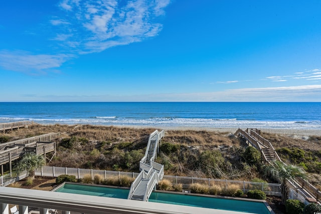 view of water feature with a beach view