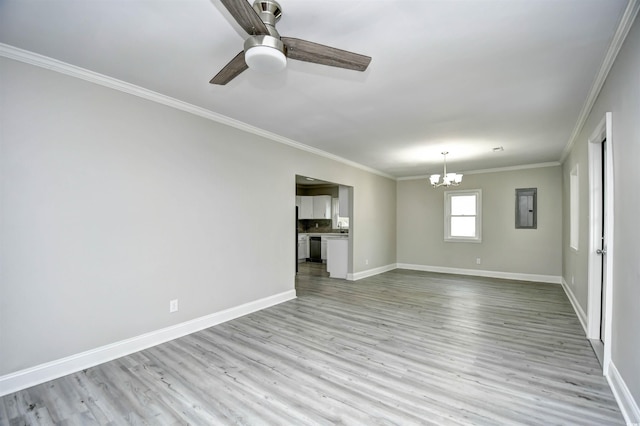 unfurnished living room with ceiling fan with notable chandelier, crown molding, and light hardwood / wood-style flooring