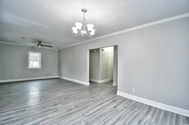 unfurnished room with light hardwood / wood-style floors, ceiling fan with notable chandelier, and ornamental molding