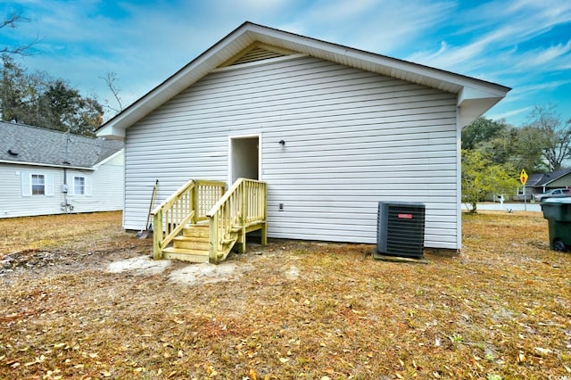 back of property with cooling unit