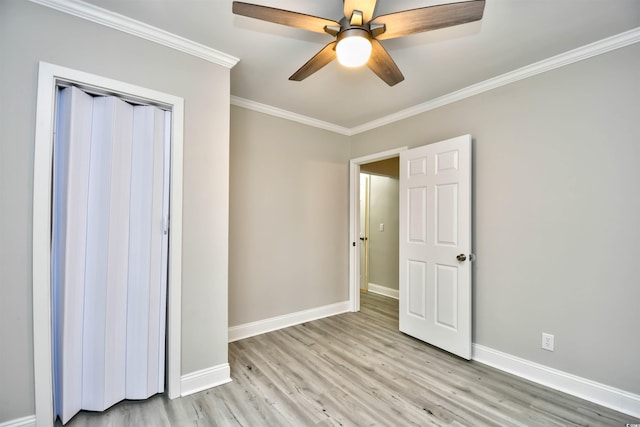 unfurnished bedroom with ceiling fan, light hardwood / wood-style flooring, and ornamental molding