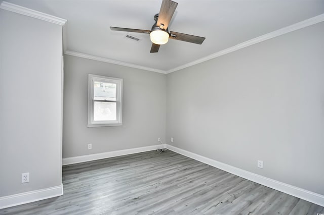 unfurnished room with wood-type flooring, ceiling fan, and crown molding