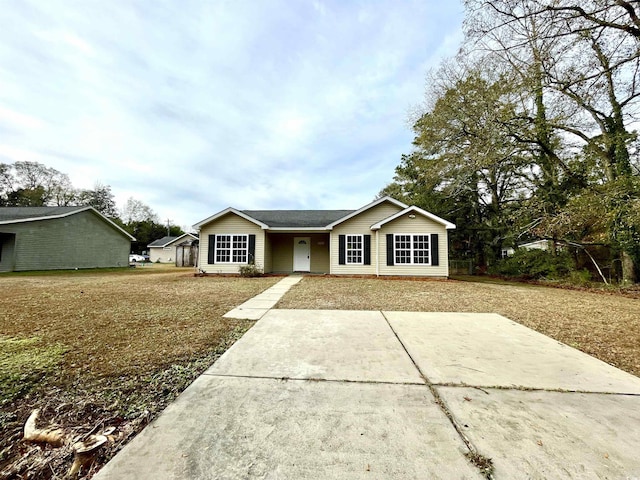 ranch-style house with a front yard