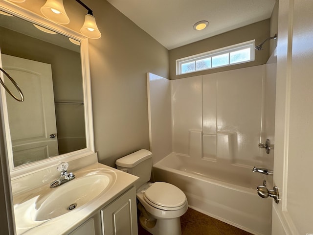 full bathroom featuring bathtub / shower combination, tile patterned floors, vanity, and toilet