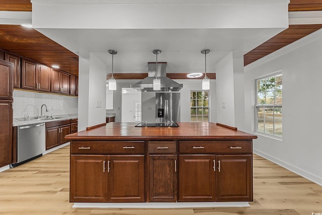 kitchen featuring appliances with stainless steel finishes, decorative light fixtures, light wood-style floors, and island range hood