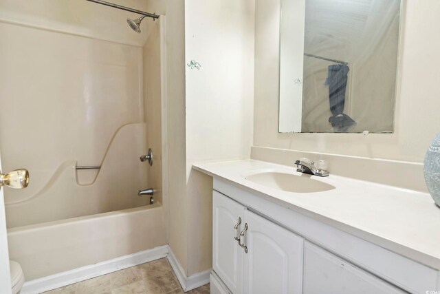 815 Rogers Dr, Myrtle Beach, SC 29577 - full bath with bathing tub / shower combination, vanity, toilet, and baseboards