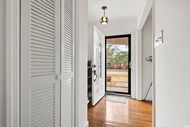 doorway to outside featuring hardwood / wood-style floors