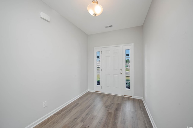 foyer with light hardwood / wood-style flooring