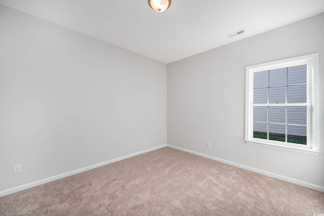 unfurnished room featuring carpet floors