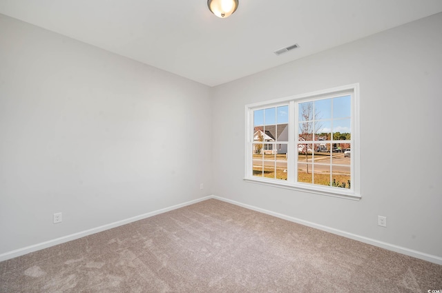 view of carpeted spare room