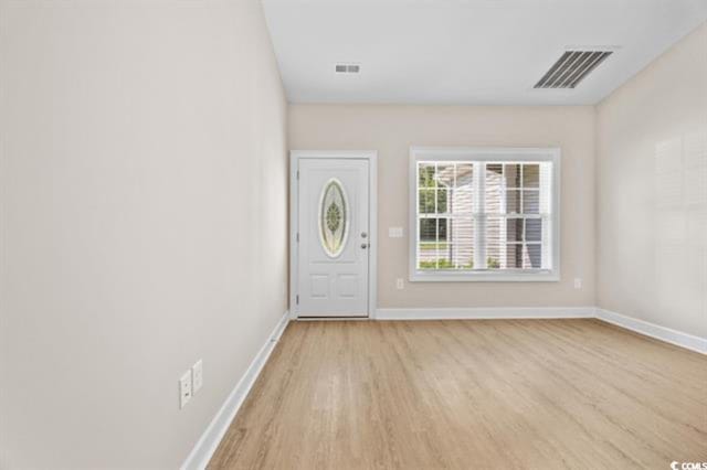 foyer entrance featuring light wood-type flooring