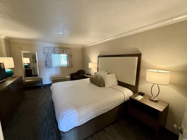 bedroom with crown molding and a textured ceiling