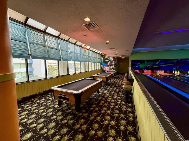 rec room featuring carpet, a textured ceiling, and billiards