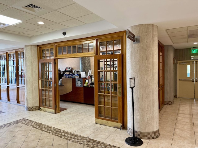 interior space with light tile patterned floors