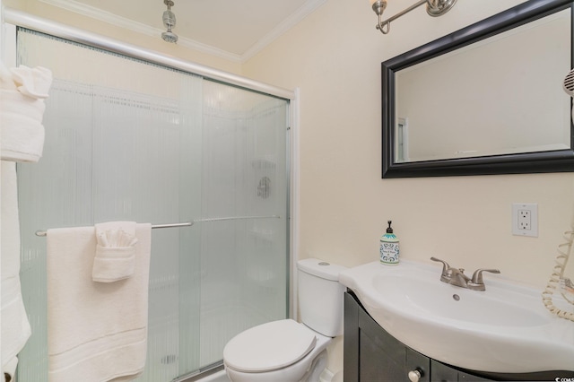 bathroom with crown molding, toilet, vanity, and walk in shower