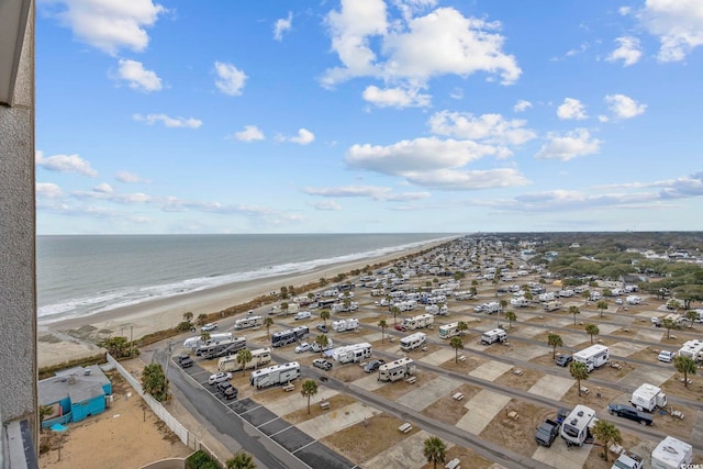 aerial view featuring a water view and a view of the beach