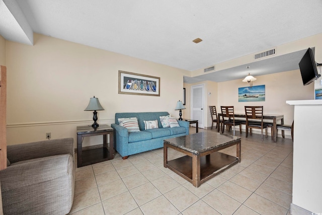 living room featuring light tile patterned floors